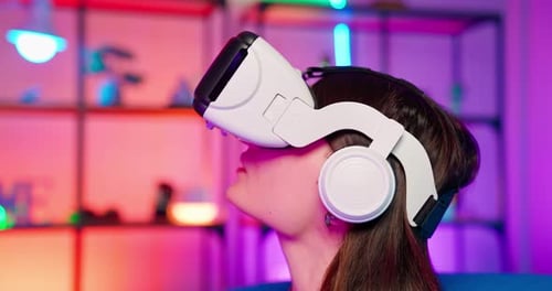 Woman Uses VR Headset in Modern Room