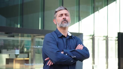 Close Up Individual Portrait of a Mature and Formal Business Man with a Reliable and Confident