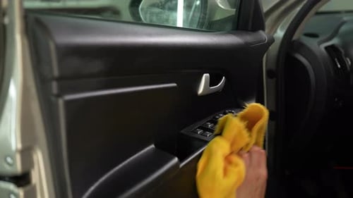 Close Up of Car Door Cleaning