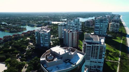 Aerial view of waterfront buildings and beach