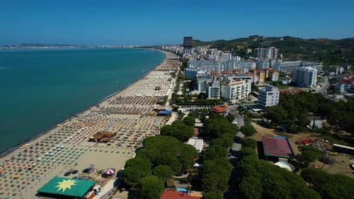 Health-friendly beach with iodized sand near green pines and Adriatic sea, hotels, and resorts for b