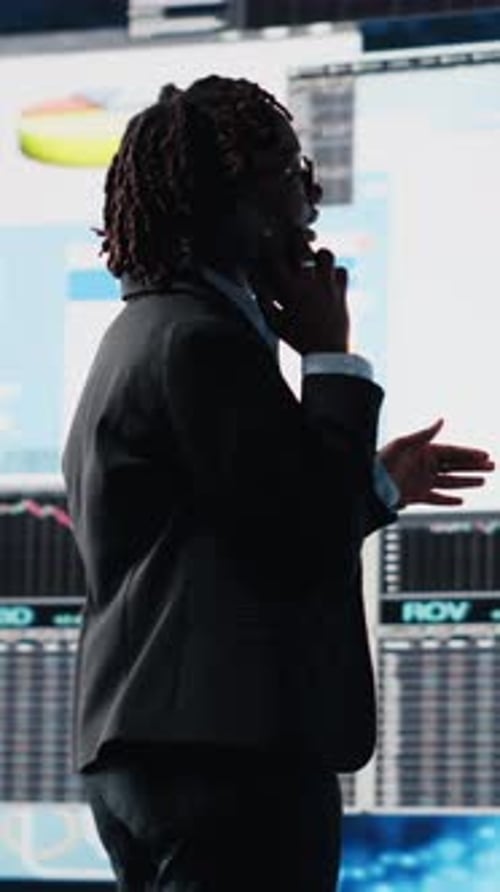 Vertical Video Manager Sending Business Market Graphs to Shareholders Using Mobile Phone