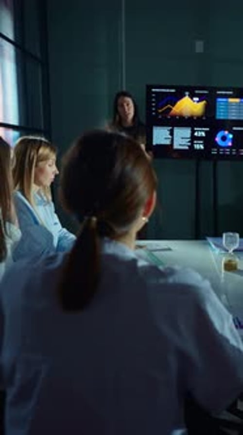 Business Presentation with Data Graphics and Women in Office