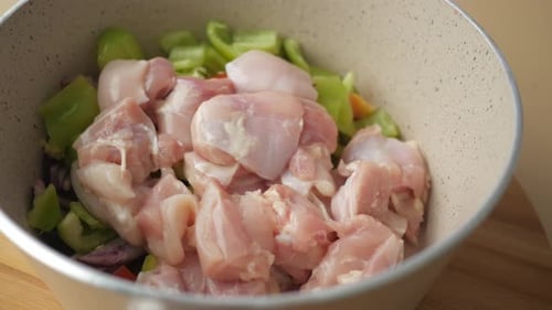 Seasoning Chicken on Dish for Cooking