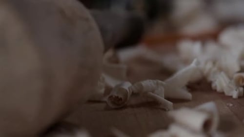 Close Up Carpentry Mallet and Wood Shavings on Workbench 3539 Years