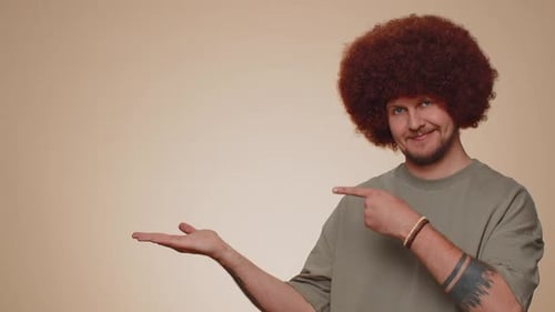 Man Pointing Empty Place Advertising Area for Commercial Text Copy Space for Goods Promotion