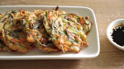 Vegetable Pancakes on Plate with Dipping Sauce