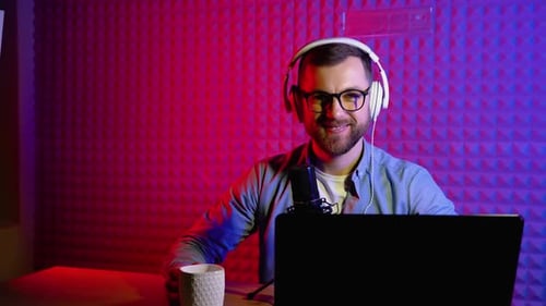 Young Adult Recording Podcast with Microphone