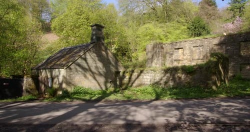 Wide shot of the Smithy and lower bleaching mill at Lumsdale waterfalls, Matlock