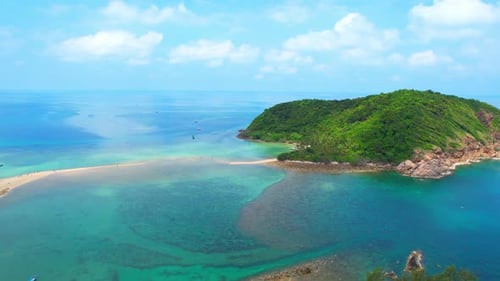 Tropical island and sandbar with stunning white sandy beaches