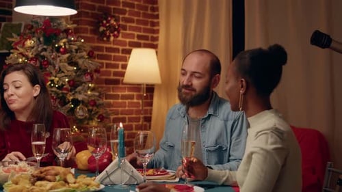 Happy Family Christmas Dinner Celebration at Home