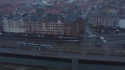 Aerial Footage Of Train Traveling In City Harbour