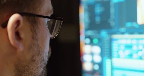 Man With Glasses Looking At Computer Screen