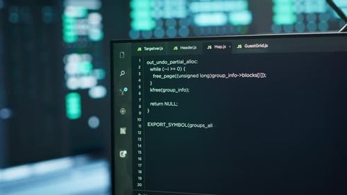 Close Up of Code Running on PC Display in High Tech Data Center