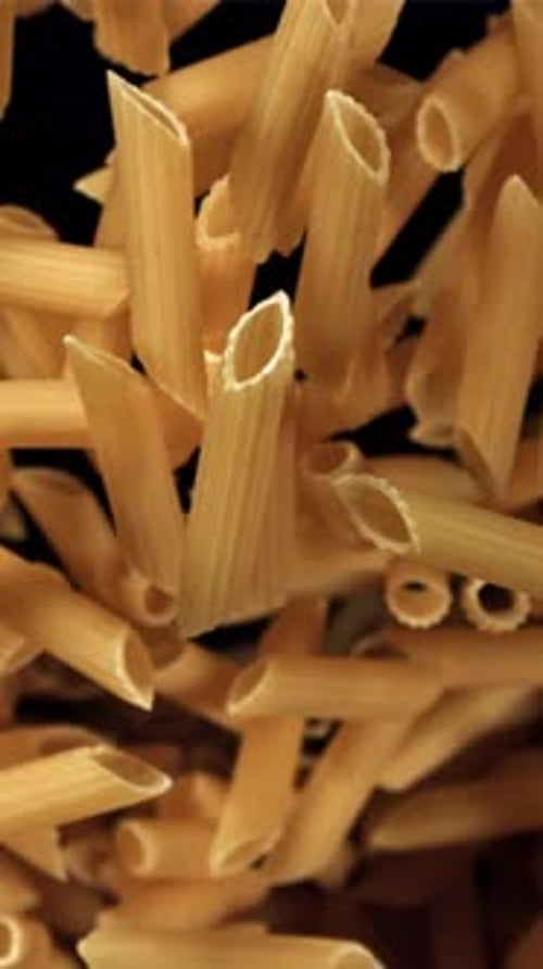 The Penne Pasta Flies Up and Falls Down Filmed on a Highspeed Camera at 1000 Fps