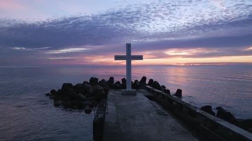 A Flight Around a Christian Holy Cross Early in the Morning at Sunrise The Large Cross Stands on the
