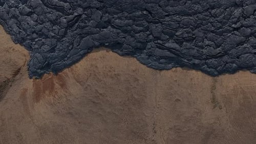 Black solidified lava field in Natthagi valley of Iceland, top down