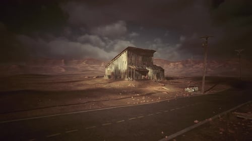 Lonely Desert Shack Bathed in Moody Evening Light with Scattered Debris