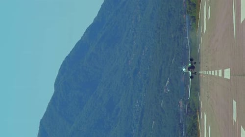 Vertical shot airplane taking off at Tivat airport in Montenegro