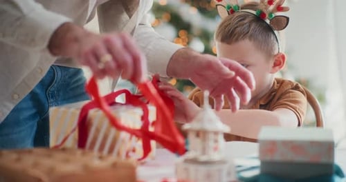 Wrapping Christmas Gifts with Family at Home