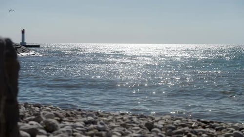 A lighthouse by the water.