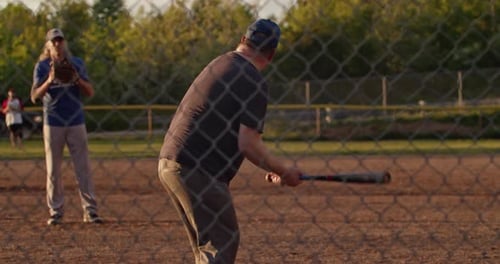 A Family Enjoying an Afternoon of Baseball in a Halifax Park