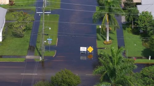 Road Under Water Warning Sign City Street Closed Because of Flooding Danger Blocking Driving of Cars