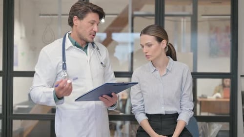 Doctor Explains Medical Results to Female Patient
