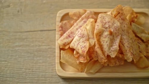Crispy Taro Chips on Wooden Plate