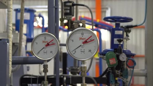 gas station with pipes with indicators. Industrial interior.