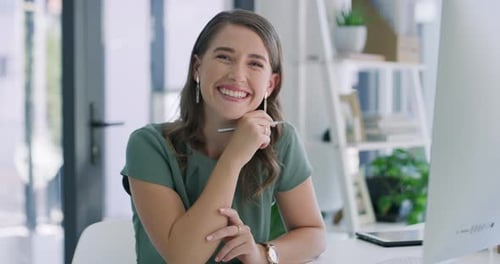 4k video footage of a young businesswoman using a computer in a modern office
