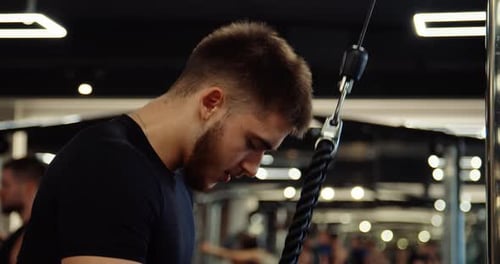 Medium Shot of Athletic Handsome Young Man Performing Bench Press in Gym Man Wears Black Long Sleeve
