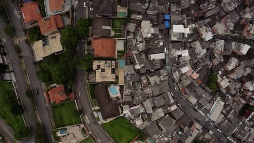Aerial view of growing inequality, gap between the rich and the poor - birdseye, drone shot
