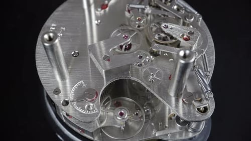 Close Up of Intricate Clockwork Gears and Springs