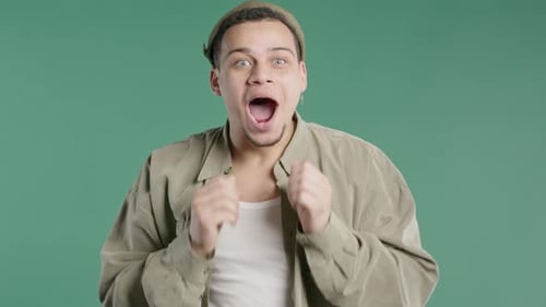 Man Reacts With Surprise and Excitement