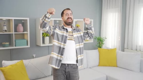 Happy dancing man full of joy.