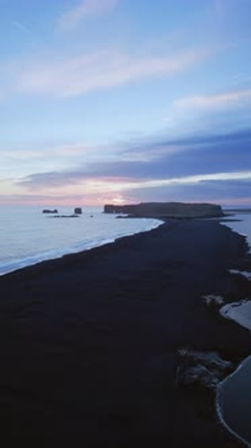 Vertical Video Drone Shot of Black Sand Beach