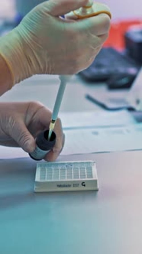 Close Up Lab Sample Pipette Extraction