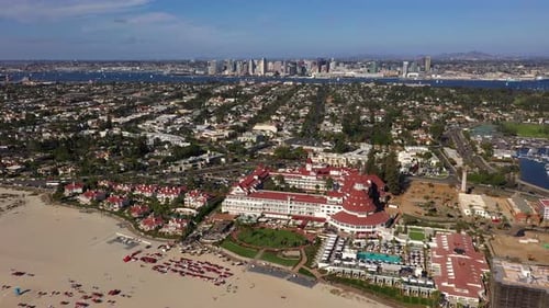 Aerial View Of Hotel del Coronado At Coronado Beach In San Diego On A Sunny Day - drone shot