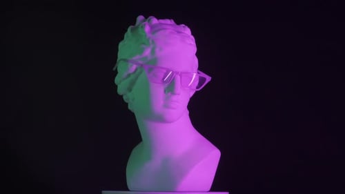 Closeup Shot Ancient Marble Bust Statue of Roman Era Woman in Glasses Spinning Round on a Platform