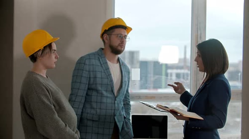 Real Estate Agent Talking to Couple in New Apartment, People Stock ...