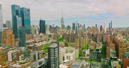 Diverse buildings in New York panorama. City combining usual structures with skyscrapers