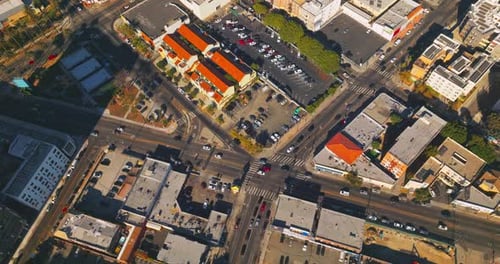 Streets of Los Angeles, United States with private transport moving around.