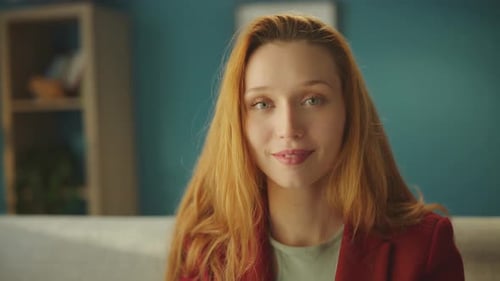 Smiling Redhead Woman in Red Blazer Close-up