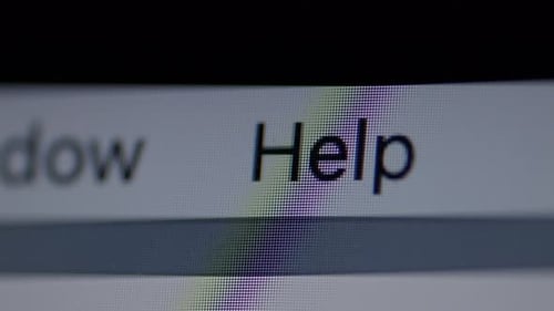 Help menu item on a computer screen with slow push forward.