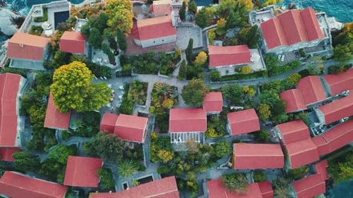 Aerial view of drone flying over island of the Sveti Stefan in Montenegro, Balkans nearby Adriatic