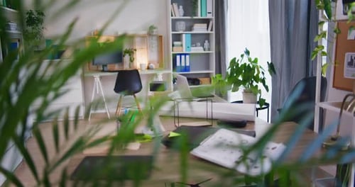 Office Space with Laptop on Desk and No Employees