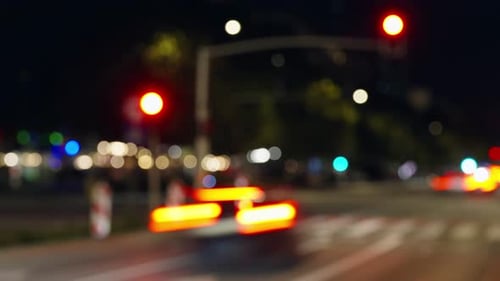 Bokeh Blurred Time Lapse Busy Street in City Downtown Evening Rush Hour Vehicles Long Exposure
