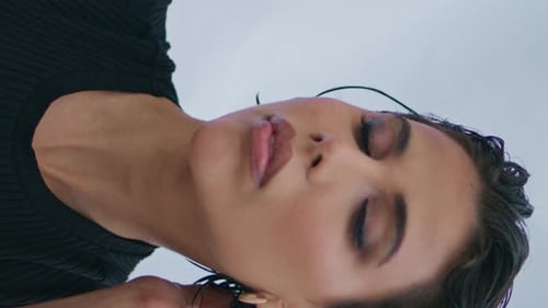 Woman with Wet Hair Posing Intimately