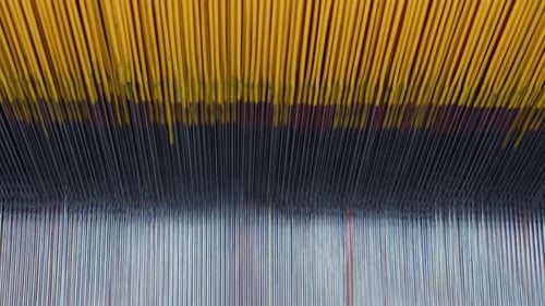 Carpet factory, carpet production, synthetic yarns for weaving loom. Electronic drive in rug weaving